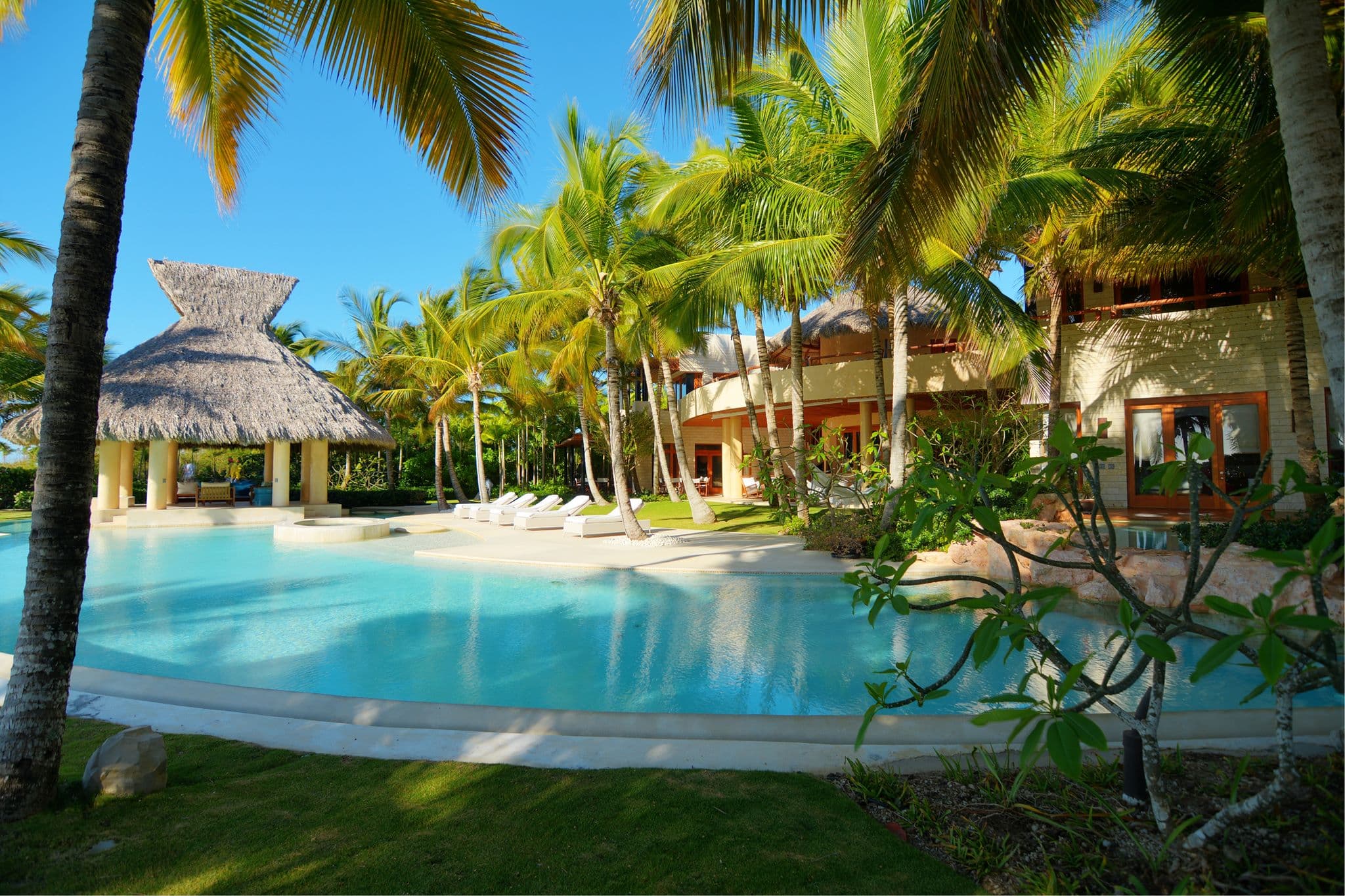 Caribbean luxury villa terrace overlooking tropical water